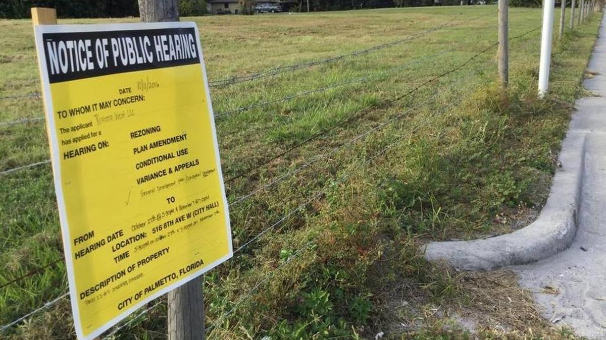 Palmetto officials are reconsidering a prior approval for a seven-story residential apartment complex in exchange for a less dense senior affordable housing proposal.