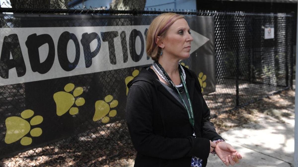 Manatee County Animal Services Chief Sarah Brown pleads for help from the public to provide a home of a dog as she talks about the over crowding situation at the shelter on Friday.