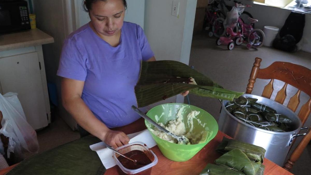 Nivia Mérida, 27, prepares tamales in her Bradenton home. Mérida is originally from Guatemala and has kept the tamale tradition alive since arriving in the United States years ago.