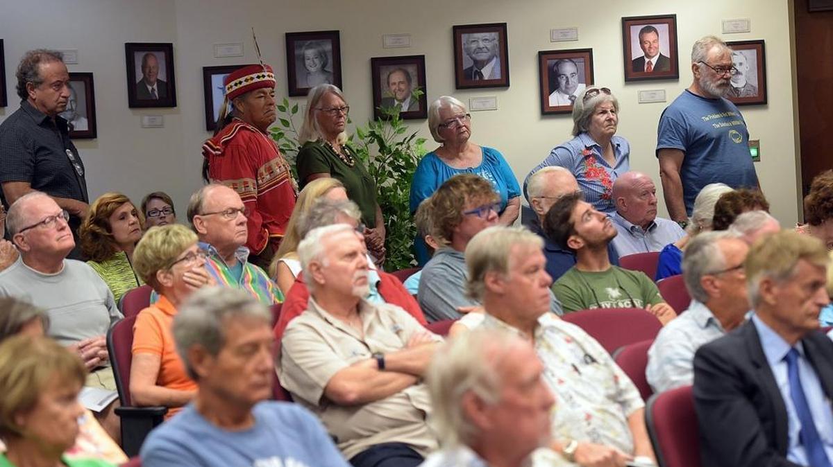 People stand in line to address the board as Aqua by the Bay development proposal goes before the Manatee County Commissioners Tuesday.