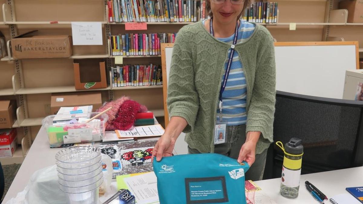 Rachel Suntop, a Manatee County librarian, runs the system’s new Books by Mail program, which allows residents not able to get to the library to be mailed materials.