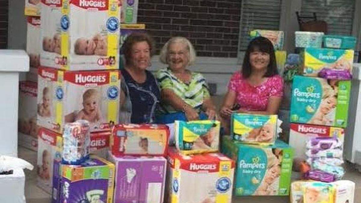 Peace Church members, from left: Patti Jung, Marlene Schmidt and Sue Donovan help round up supplies for mothers in crisis.