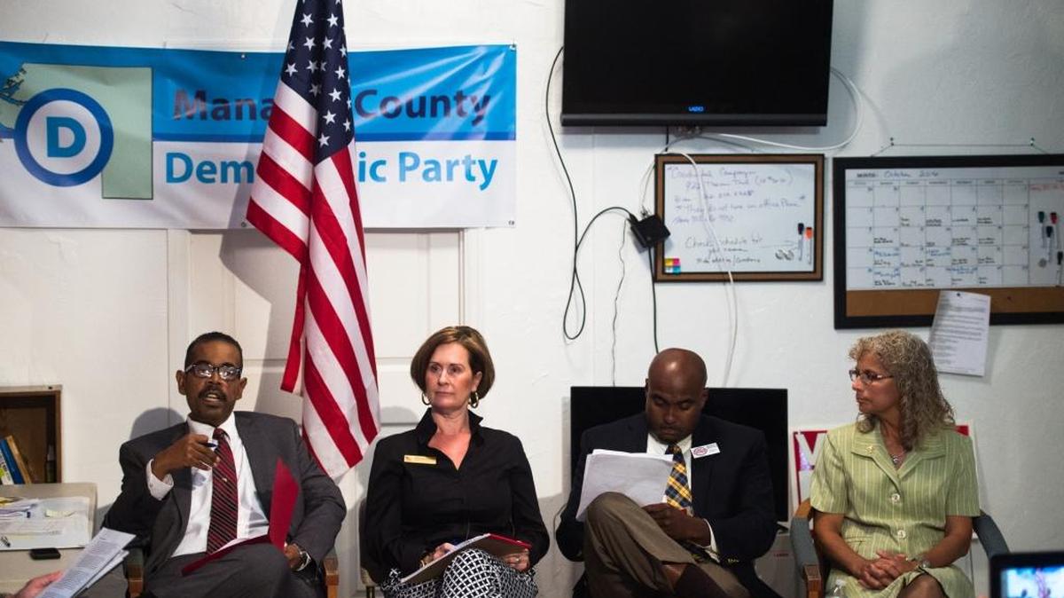From left, Bradenton City Council candidates Harold Byrd, Devon Davis, Keenan Wooten and Tamara Goudy-Spyker answer questions as the LGBT Democratic Caucus hosts a forum Wednesday for council candidates at the Manatee Democrat Headquarters in Bradenton.