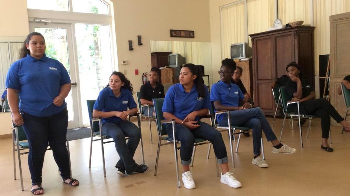 Oasis Middle School students practice their docu-drama on racism.