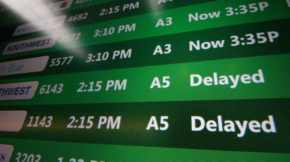 File: Flights departing from Pittsburgh International Airport are delayed early Tuesday afternoon, Nov. 26, 2013 in Imperial, Pa. (AP Photo/Gene J. Puskar)
