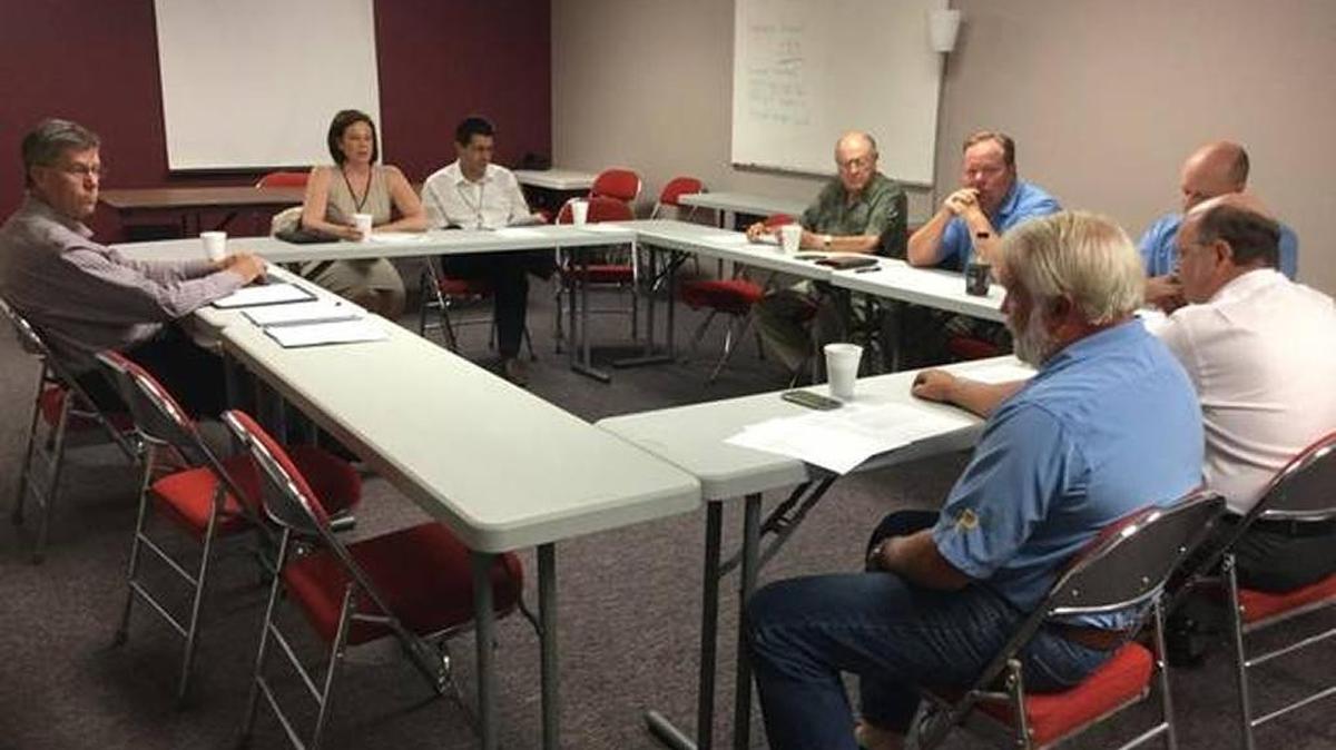Carl Callahan, Bradenton city administrator, left, faces six accusations levied by a local citizen with the Florida Commission on Ethics at a Jan. 27 hearing.