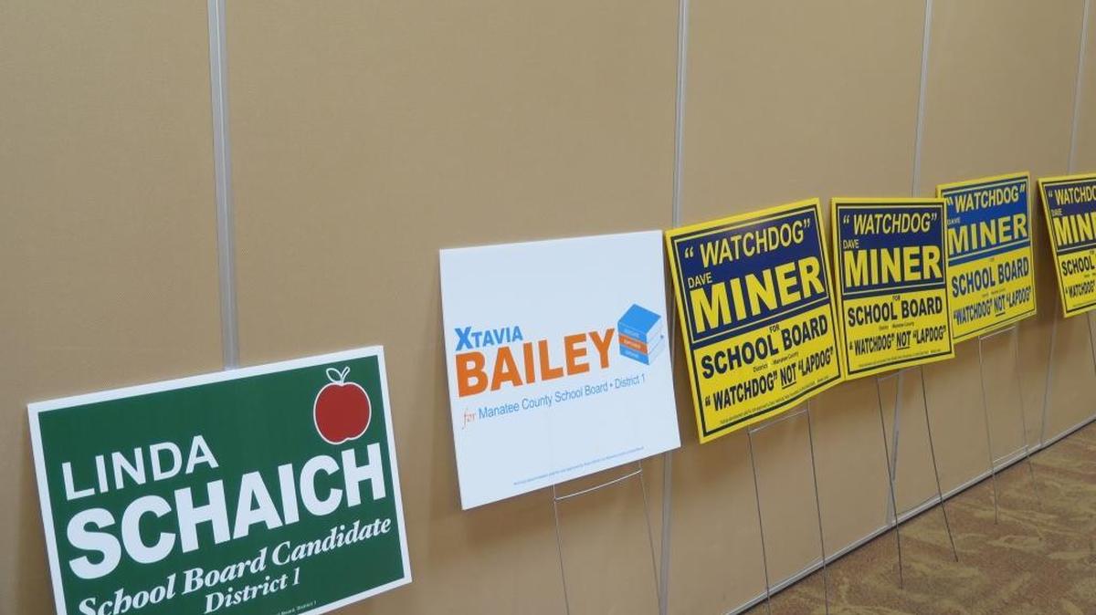 Manatee County School Board candidates signs line the room at the Women of Manatee County Republican Club luncheon Friday.
