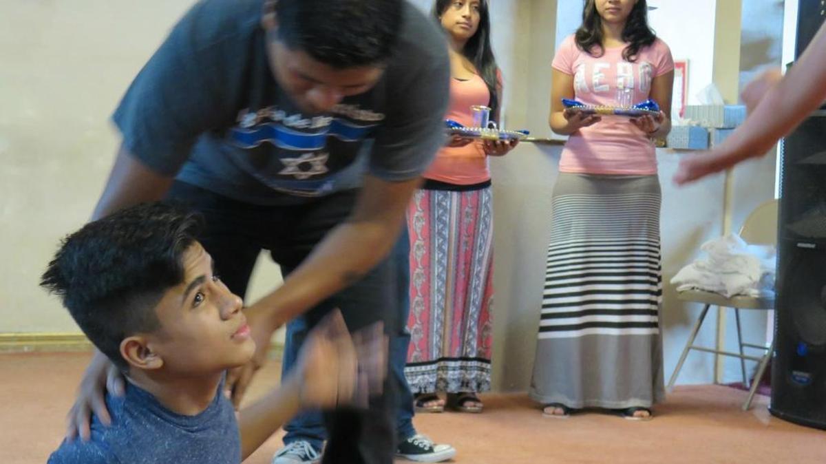 Nefi Melgar, 15, looks up during a rehearsal Tuesday evening for an upcoming drama created by youth at the Prophetic Apostolic International Church in Bradenton. At the show to be held Saturday night, Melgar will play the crippled Mephibosheth from the Books of Samuel.