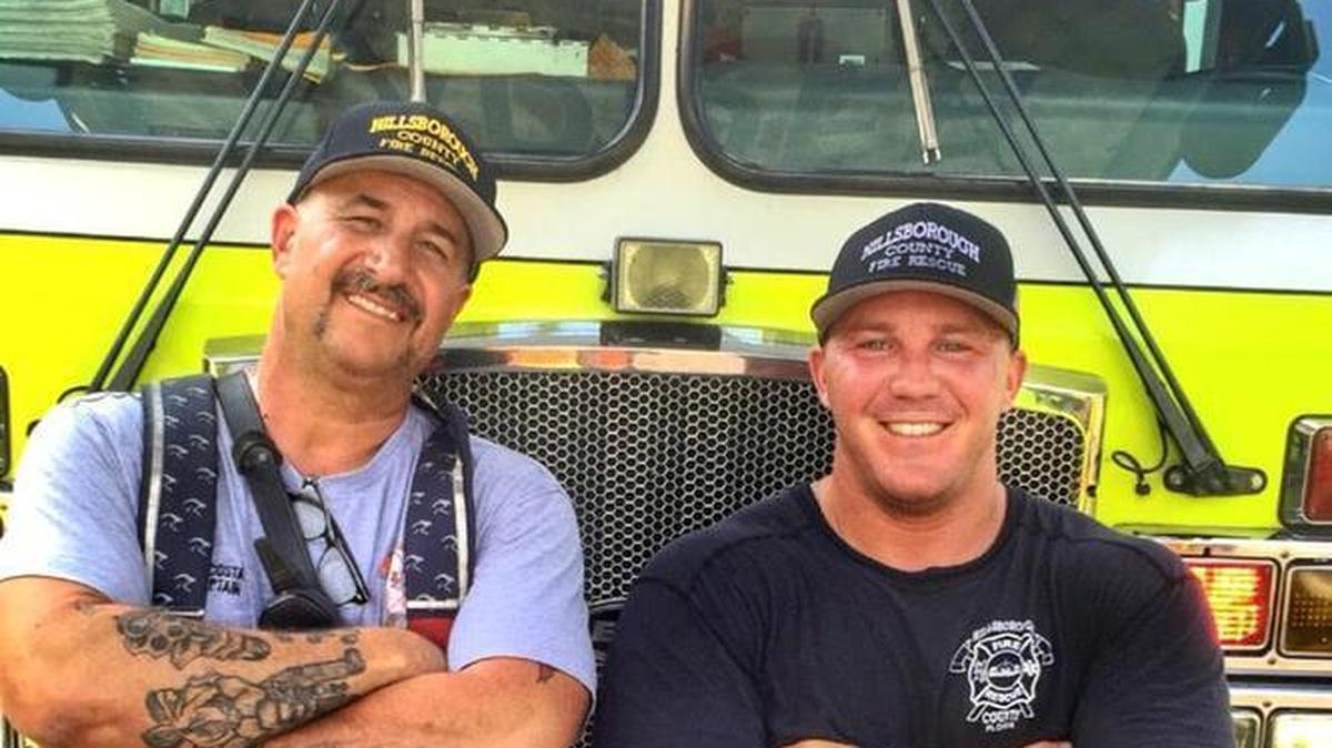 James Costa (left) and Clinton Walker in May 2016 before Costa’s retirement from the Hillsborough County Fire Rescue.