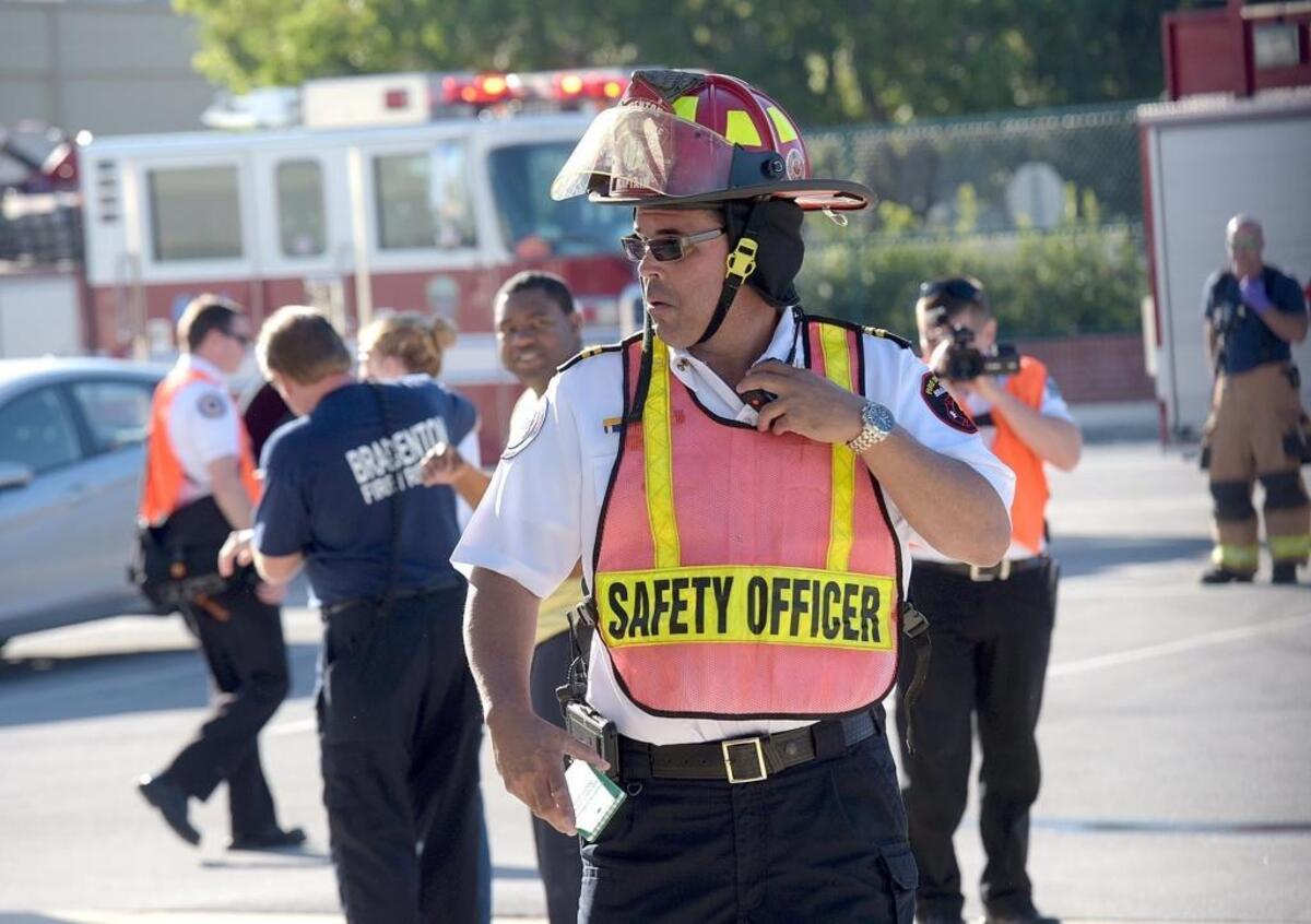 Responders evacuate volunteer casualties during Operation Inshore Slam, a full-scale exercise to test the response from local emergency responders to a multi-casualty terrorism event unfolds Wednesday at LECOM Park.