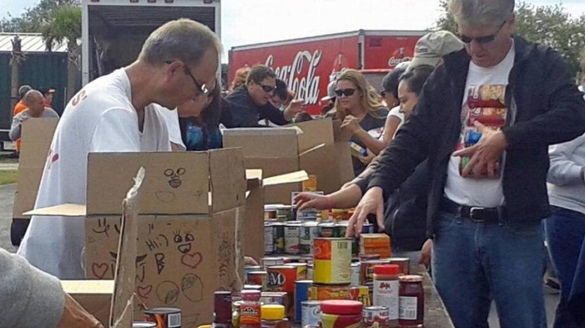 Volunteers sort food at a previous Mayors’ Feed the Hungry Thanksgiving food drive. The annual food drive to serve the area’s needy population is currently underway.