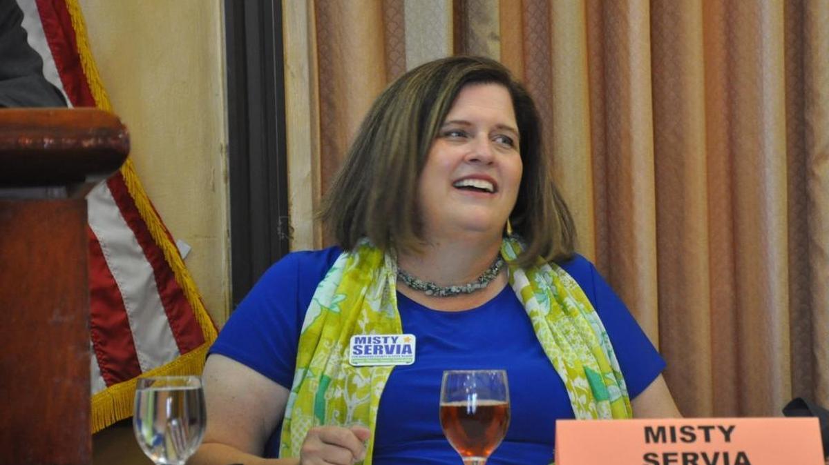 Misty Servia, a candidate for District 3 on the Manatee County School Board, answers a question during the Manatee Tiger Bay Club meeting Thursday.