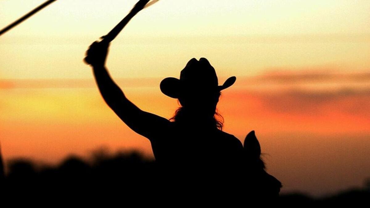 Rider cracks a whip for the annual Florida Cracker Trail ride across Florida. The ride commemorates cross-state cattle drives to ports on the west coast to be shipped to Cuba more than 160 years ago.