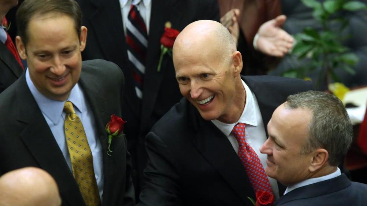 Whose budget will prevail? From left, Senate President Joe Negron, R-Stuart, Gov. Rick Scott and House Speaker Richard Corcoran, R-Land O’Lakes were all smiles a year ago on the first day of the 2016 session, Jan. 12, 2016, in Tallahassee.