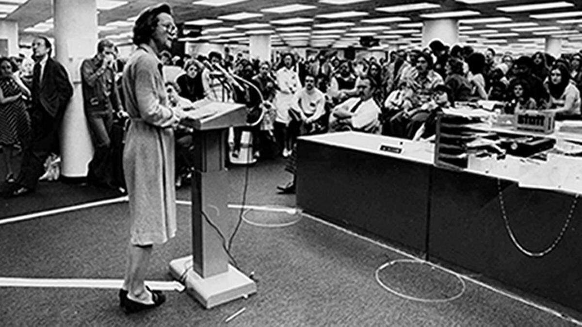 Katharine Graham speaks to newsroom employees shortly after the beginning of the pressmen's strike against the newspaper in October 1975.