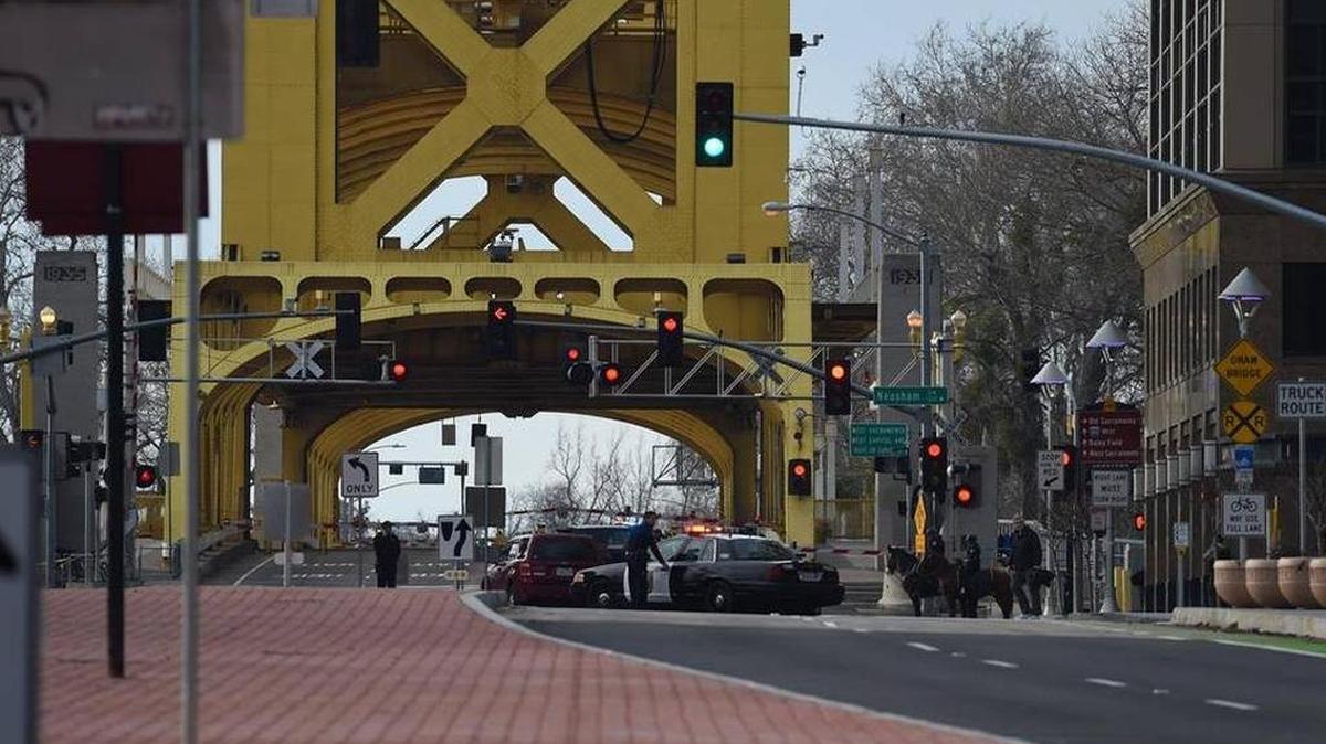 Reports of a woman possessing a bomb led authorities to clear and block Tower Bridge between downtown Sacramento and West Sacramento on Tuesday.