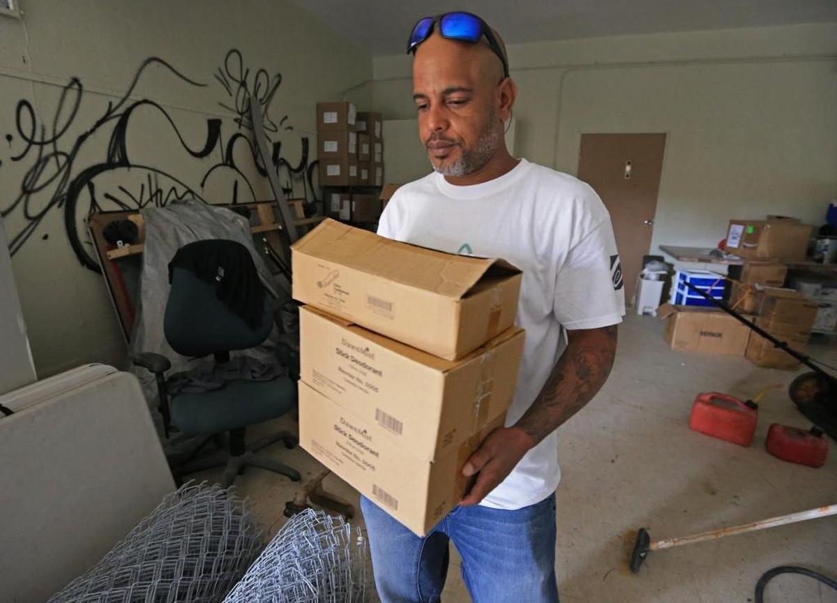 Mountain Point outreach counselor, Carlos Sanchez, carries supplies from a storage area in Cidra, Puerto Rico on Thursday, October 19, 2017. The non-governmental organization offers participants new syringes and the removal of used syringes, one-on-one education on risk reduction, snacks, hygiene and first aid equipment.