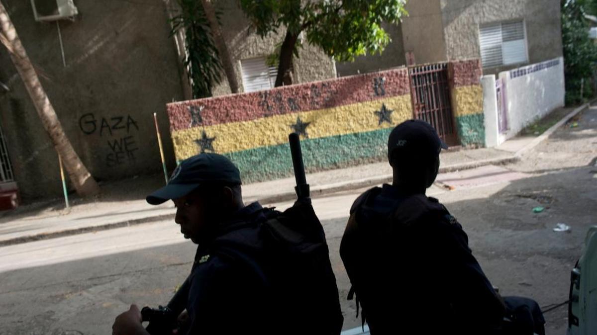 Members of the Mobile Reserve, an arm of the national police, patrol the neighborhood of Dunkirk in Kingston, Jamaica, June 6, 2013.