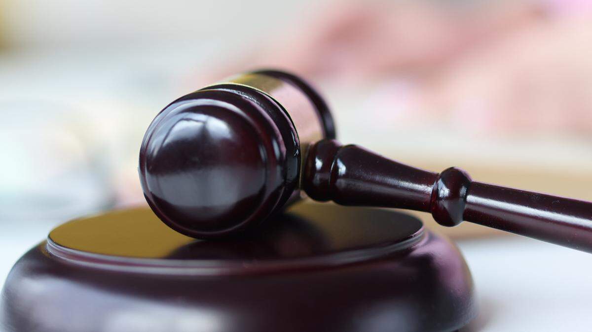 Judge’s wooden gavel on table. Judicial decisions in civil cases concept