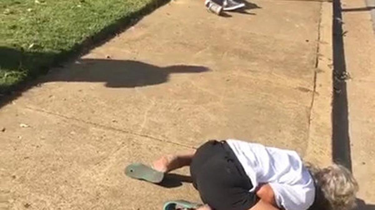 Facebook video captures an unconscious couple, Ronald and Carla Hiers, unconscious on a sidewalk after they suffered heroin overdoses.