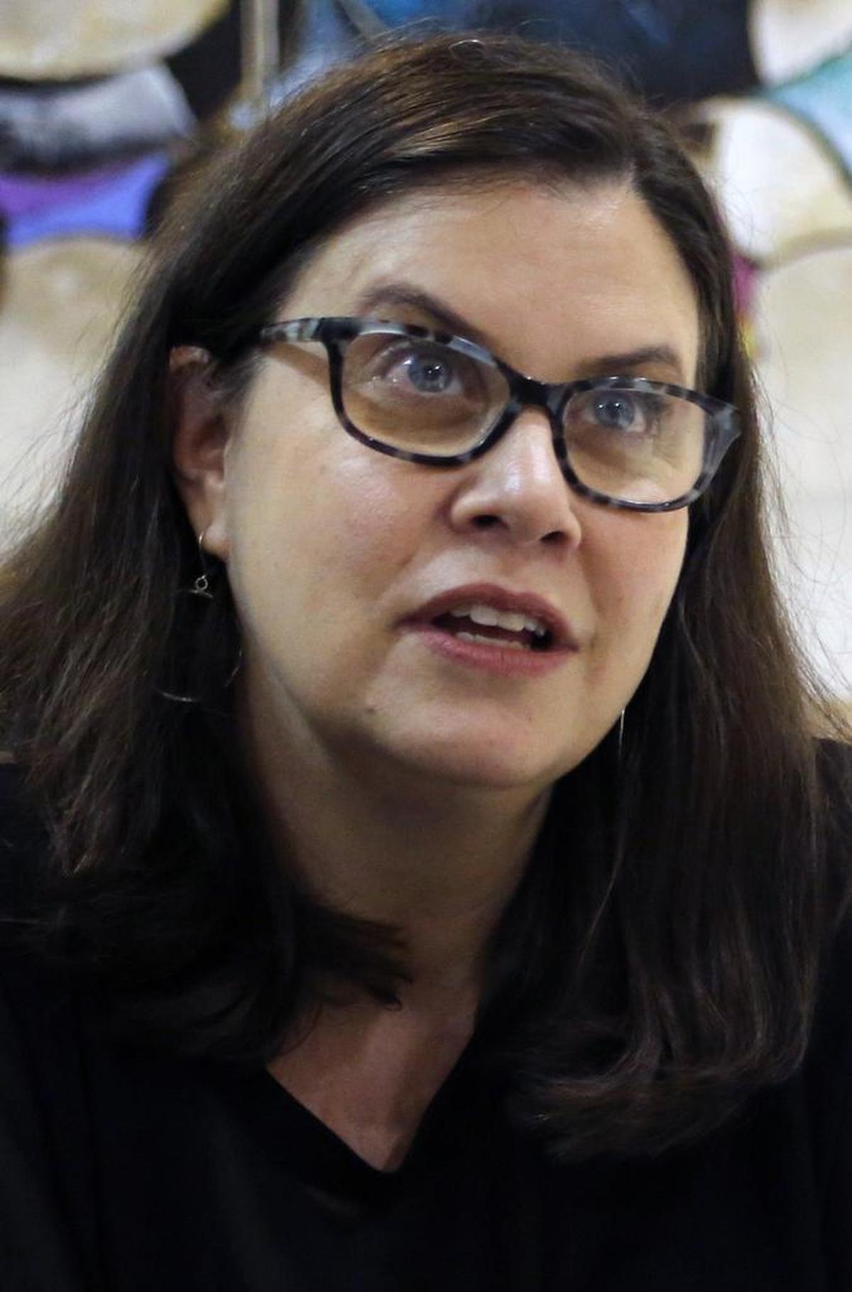 Alexandra Zapruder, granddaughter of the Abraham Zapruder who filmed the JFK assassination, signs copies of her book about the tension in and pressure on her family that the home movie created for her family.