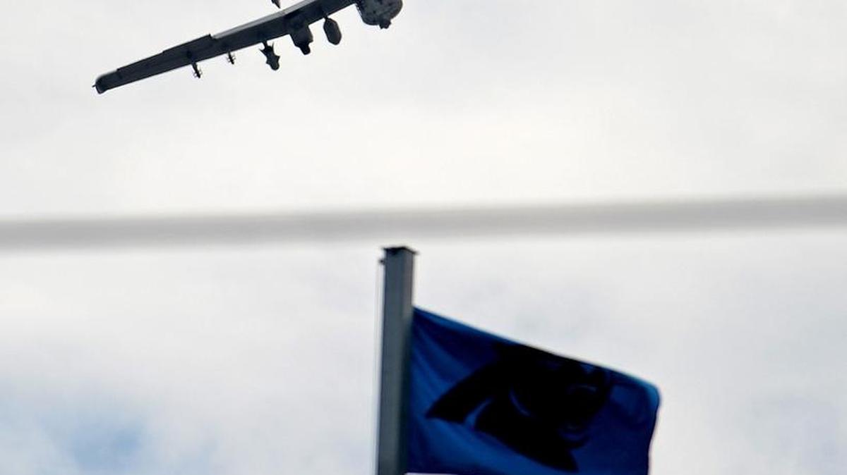 One of four A-10 Warthog jets skirts over Bank of America Stadium Monday on Monday.