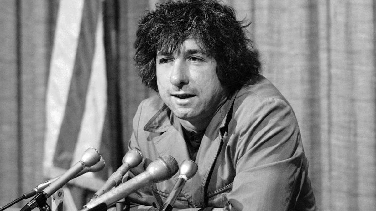 In this Dec. 6, 1973 file photo, political activist Tom Hayden, husband of Jane Fonda, tells newsmen in Los Angeles that he believes public support was partially responsible for the decision not to send him and others of the Chicago 7 to jail for contempt. Hayden, the famed 1960s anti-war activist who moved beyond his notoriety as a Chicago 8 defendant to become a California legislator, author and lecturer, has died. He was 76.