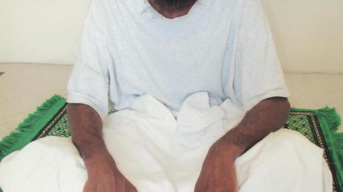 Mustafa al Hawsawi posing for the International Red Cross at Guantánamo in a photo that appeared on a Middle Eastern website.