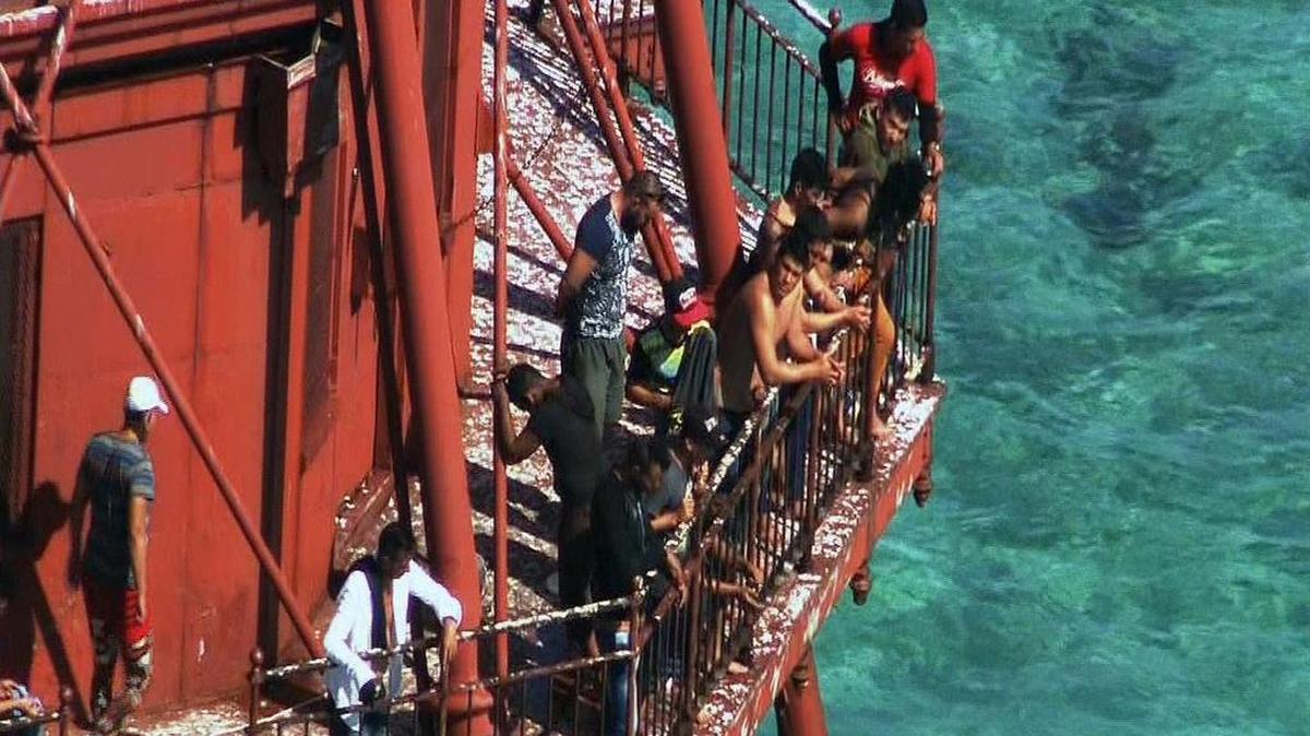 Group of Cubans atop American Shoal Lighthouse off Sugarloaf Key in standoff with Coast Guard on Friday, May 20, 2016. Photos courtesy WSVN.