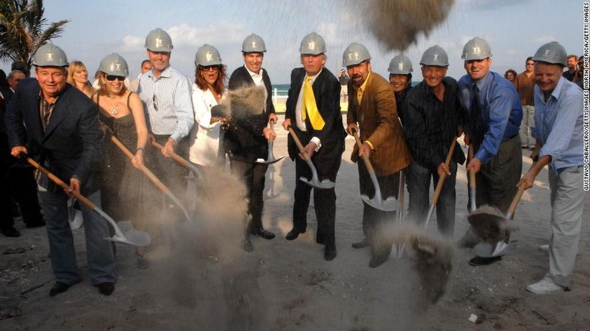In this Getty image from 2007, Tom Murphy Jr. (pictured far left) appears in a group photo with Donald Trump (center) during the ground-breaking for Trump Hollywood. CNN.com