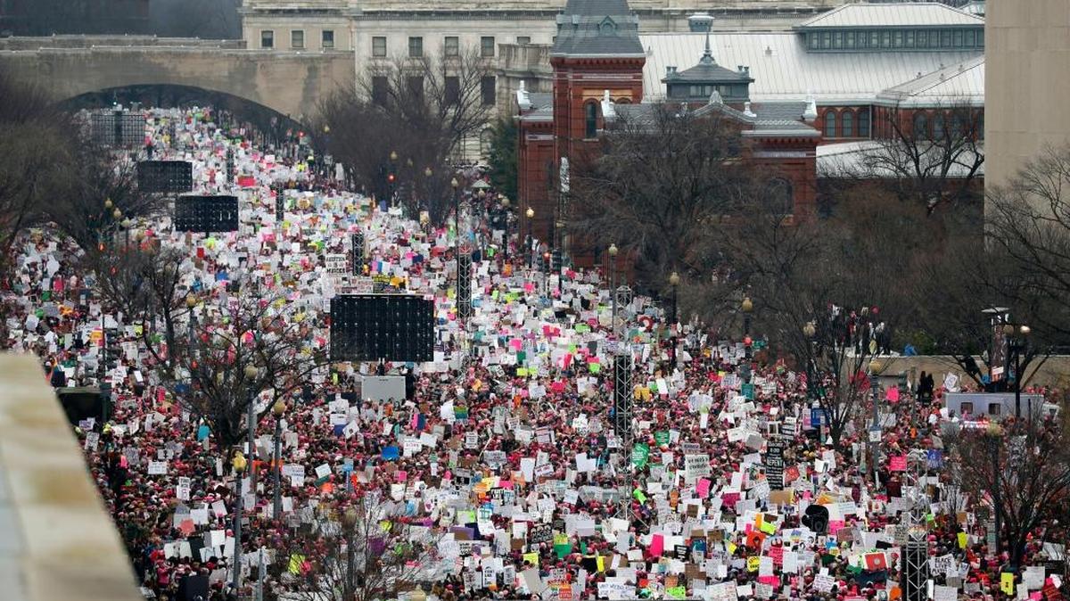 FILE - In this Jan. 21, 2017, file photo, a crowd fills Independence Avenue during the Women's March on Washington, in Washington. Social media is fueling resistance to President Donald Trump, helping people organize protests, raise money for refugee and immigrant rights groups and otherwise get the word out. It's making possible political action that organizers from the 1960s could have hardly imagined.