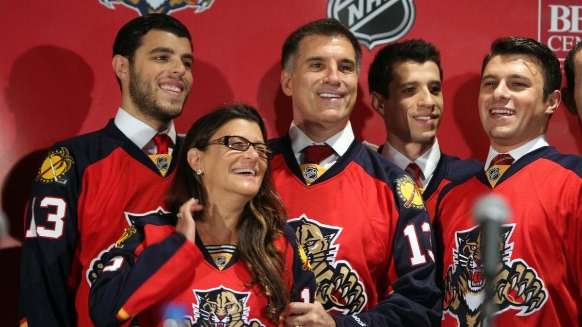 Vinnie Viola is surrounded by family members (sons Travis, Michael and John with wife Teresa) after being introduced as the new owner of the Florida Panthers in 2013.