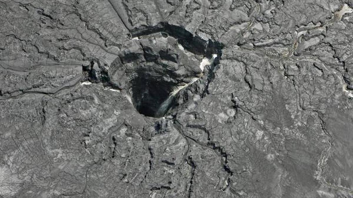 An aerial photo shows a massive sinkhole Sept. 16 in Mulberry that opened up underneath a gypsum stack at a Mosaic phosphate fertilizer plant.