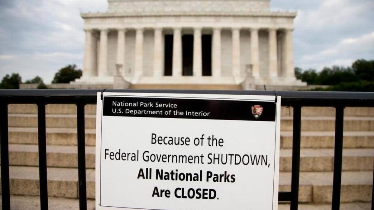 A sign noting the shutdown of all national parks is posted in front of the Lincoln Memorial in Washington on Oct. 1, 2013, the first day the last government shutdown. The 2013 shutdown lasted 17 days and forced 800,000 federal workers off the job. Another federal shutdown could occur late this week if Congress and the White House cannot resolve disputes over spending, immigration and other issues.