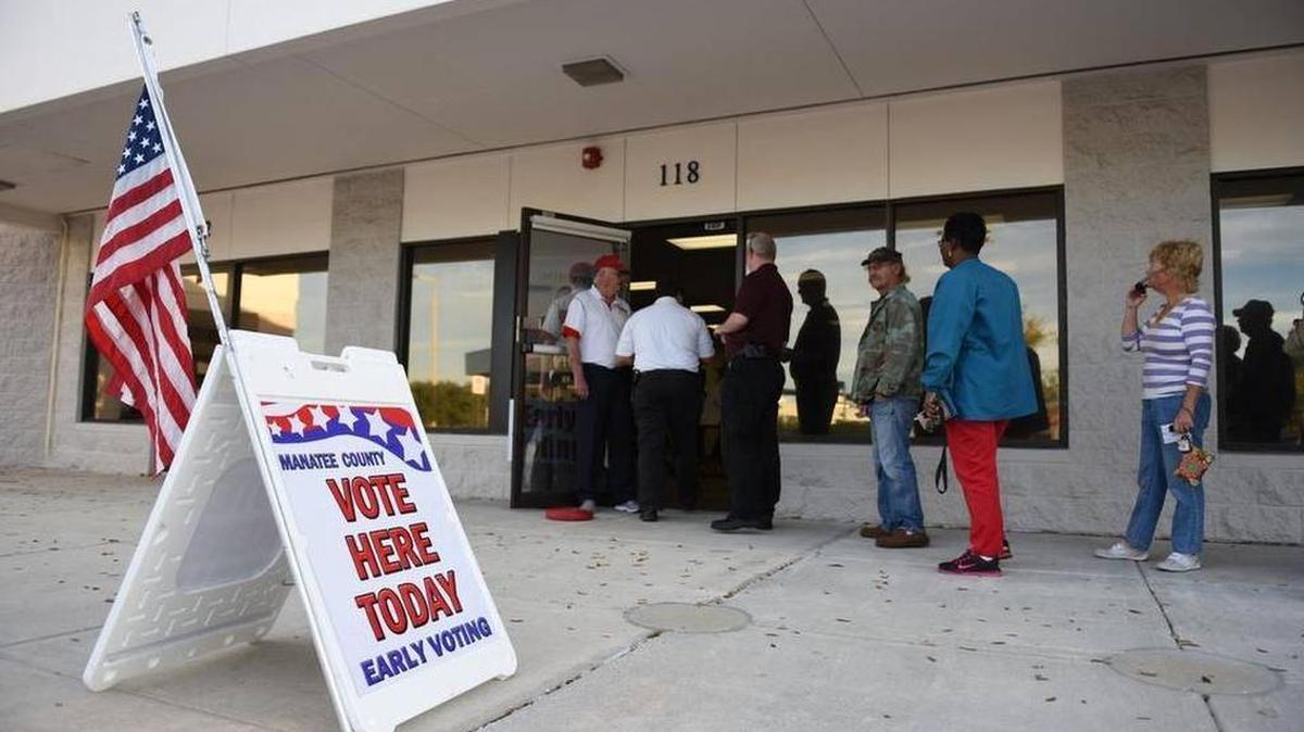 Voters line up at the Manatee County Supervisor of Elections office to cast their ballots early on Monday.