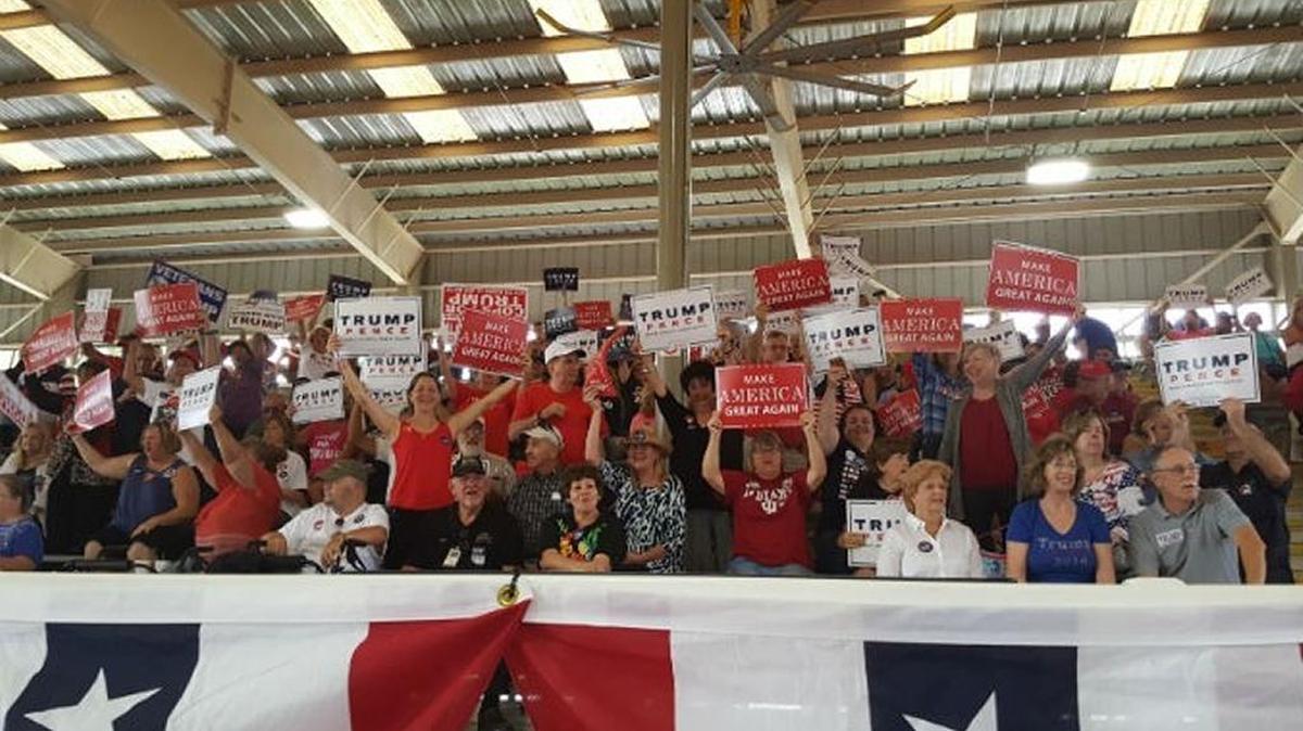 A crowd gathers to hear Donald Trump speak at rally at Southeast Livestock Pavillion in Ocala, Wednesday, Oct. 12, 2016.