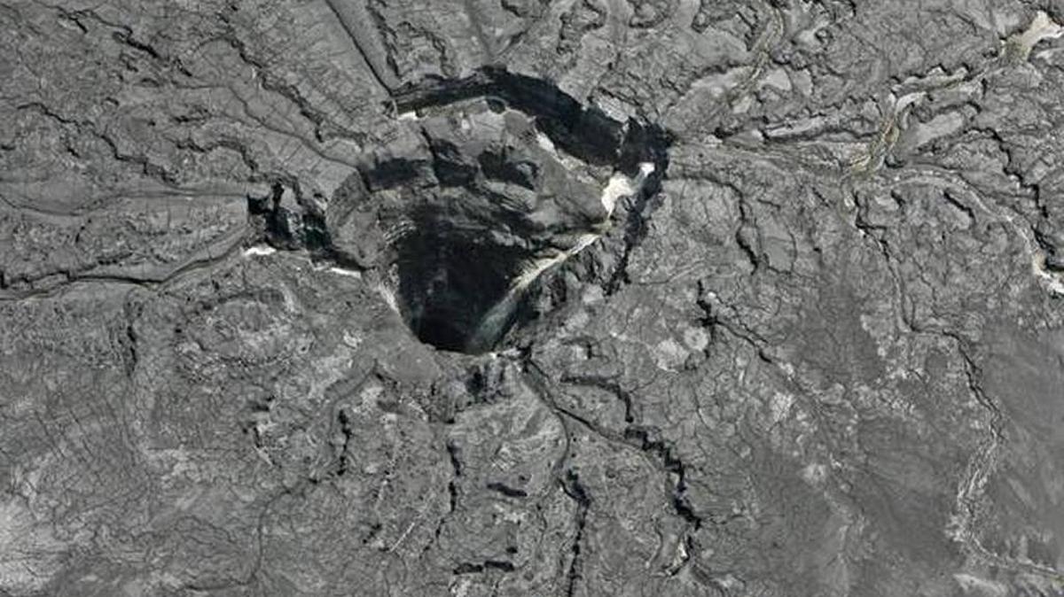 This aerial file photo shows the sinkhole that opened up underneath a gypsum stack at the Mosaic plant in Mulberry.