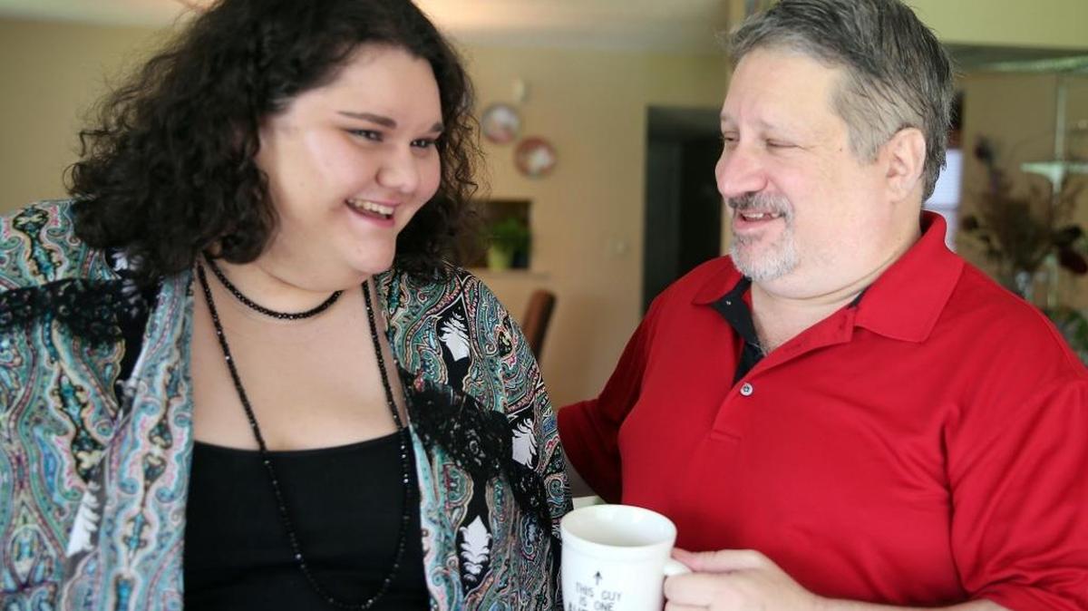 Haylee Kalick and her father, Bruce Kalick, in their Weston home, June 29, 2017. Haylee, 21, has not been committed to a hospital psychiatric ward in more than two years. Before Haylee qualified for Medicaid, she was institutionalized against her will under Florida’s Baker Act nearly 20 times, Bruce Kalick says. Now he worries that cuts to Medicaid proposed by Congress will send his daughter spiraling back to instability.
