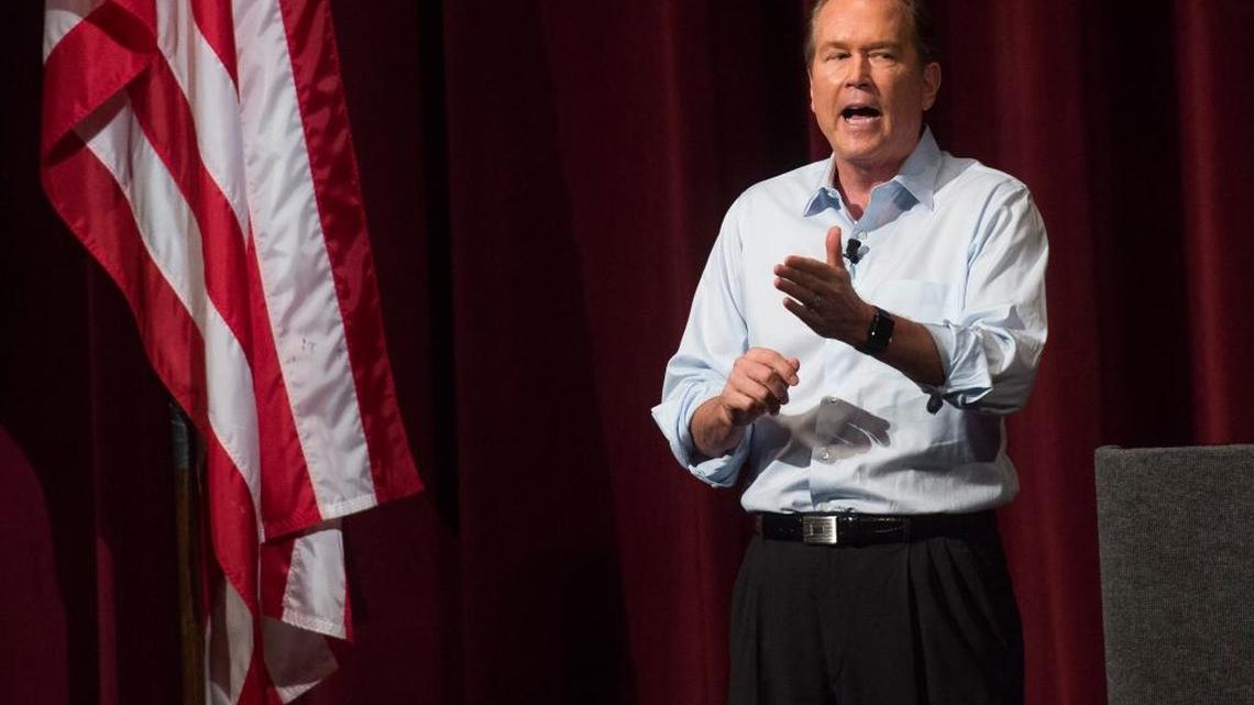 Congressman Vern Buchanan answers questions during a town hall March 18 in Sarasota.