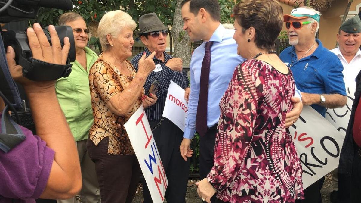 Marco Rubio greets supporters at West Miami City Hall, where he voted early for the Nov. 8 election.