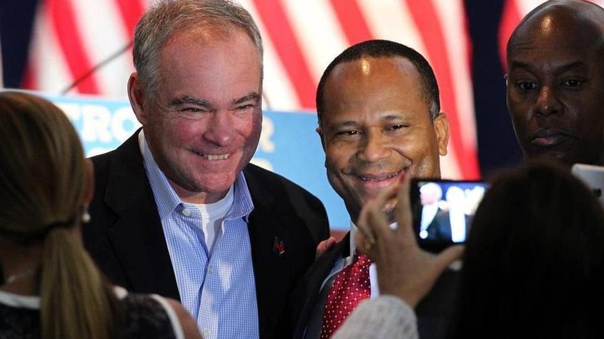 Tim Kaine poses with Patricio Moreno, chairman of the Democratic Hispanic Caucus of Florida, in Pembroke Pines.