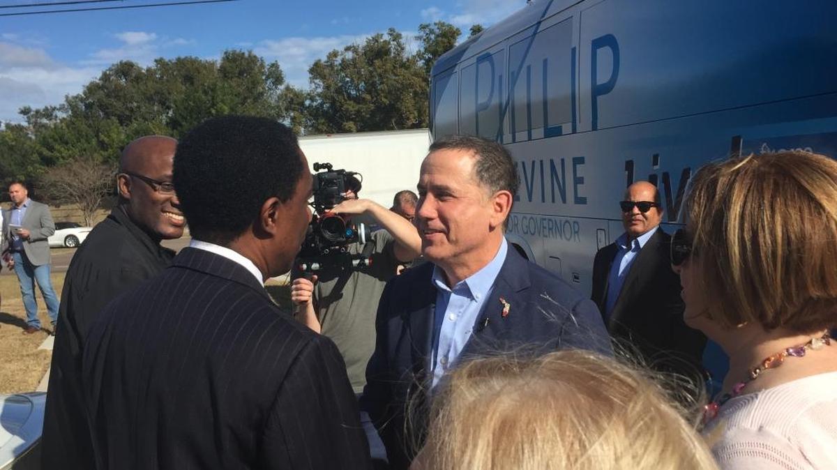 Philip Levine, a former mayor of Miami Beach now running for governor, greets voters in Orlando.