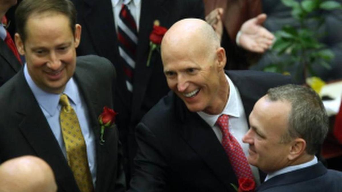 Florida House Speaker Richard Corcoran, left, and Gov. Rick Scott.