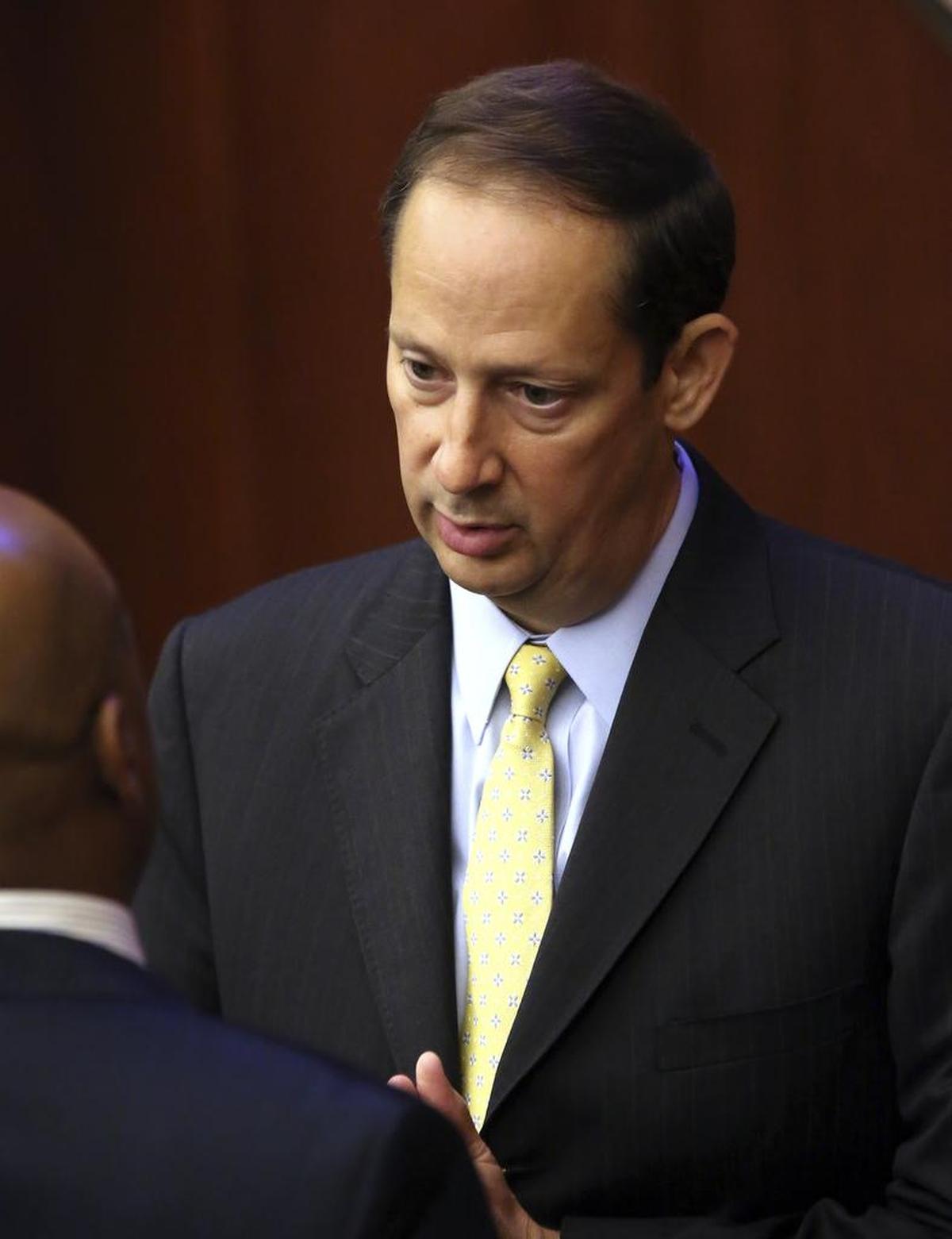 Senate President Joe Negron, R-Stuart, confers with minority leader Sen. Oscar Braynon, D-Miami Gardens, before the start of session, Friday, June 9, 2017, in Tallahassee.