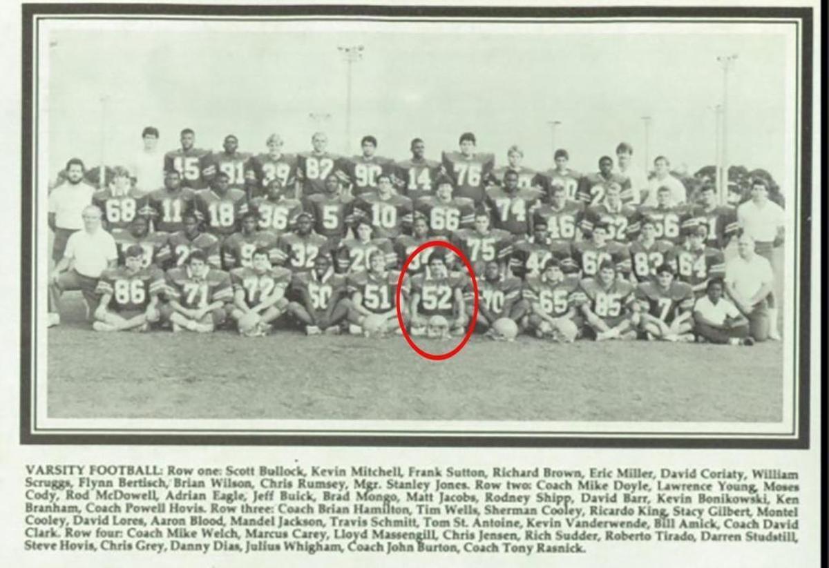 David Coriaty, circled in red, pictured in a 1987 football team yearbook photo from Palm Beach Gardens High School.