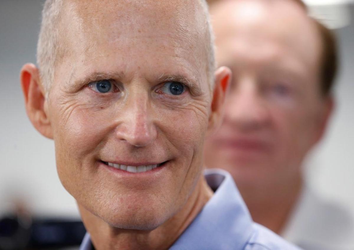 Gov. Rick Scott answers questions at news conference, in Sunrise, May 3, 2017.
