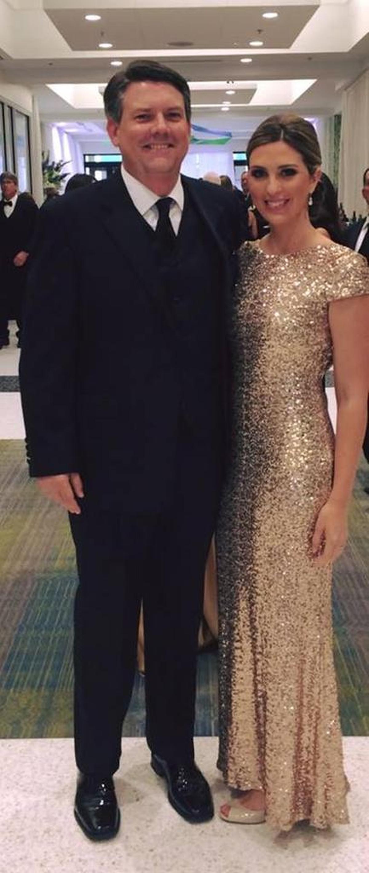 Rachel Perrin Rogers and her husband, Brian Hughes.