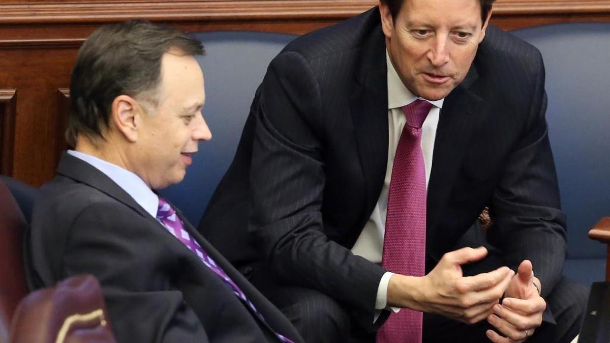 Former Senate President Tom Lee, R-Thonotosassa, left, confers with Sen. Bill Galvano, R-Bradenton, during session, Thursday, March 9, 2017, in Tallahassee.