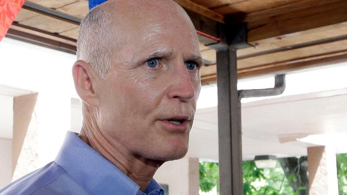 Florida Gov. Rick Scott, pictured here in Miami in August, wants to retaliate against seaports that sign business agreements with the Cuban government.