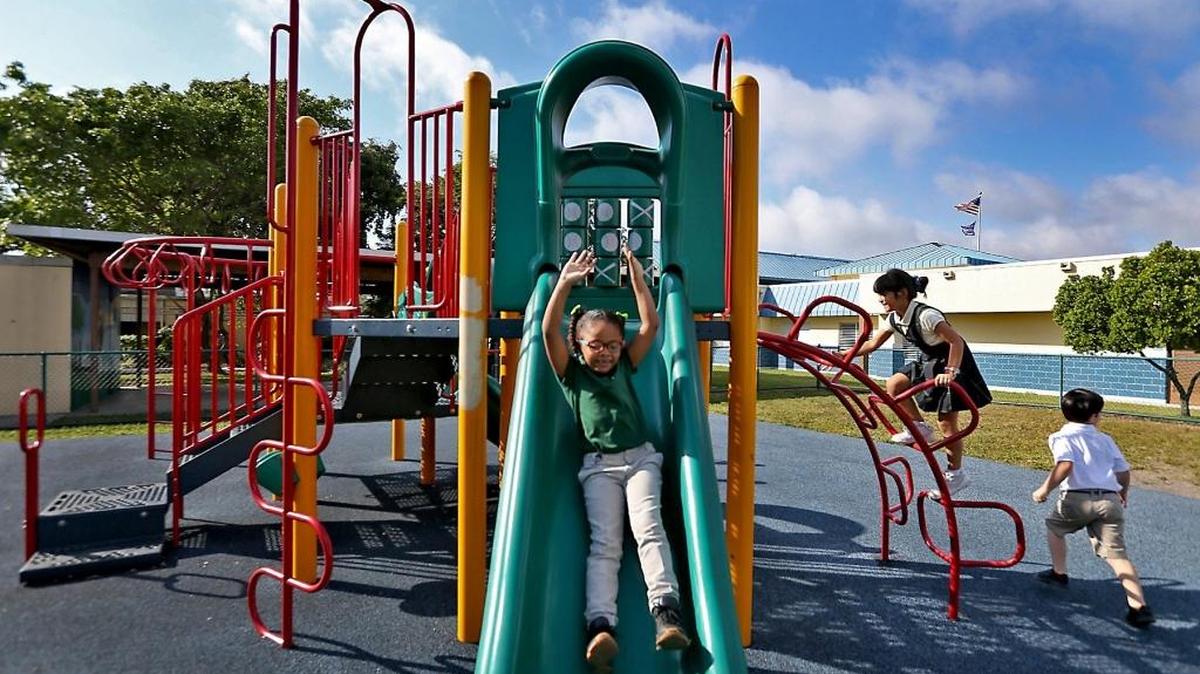 Loana Paine 6, plays on the slide during recess at Citrus Grove Elementary School on Thursday, February 9, 2017. Florida lawmakers are again considering a statewide mandate for daily recess in public elementary schools.